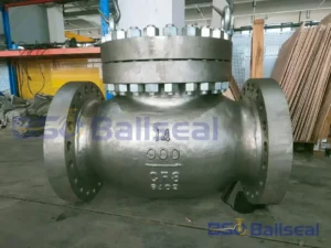 BSO Ballseal workshop floor showing a heavy-duty 14-inch Class 900 CF8 stainless steel swing check valve for high-pressure pipeline backflow prevention.
